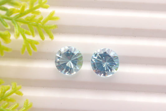 Pair of Blue Topaz Concave Cut Round Shape